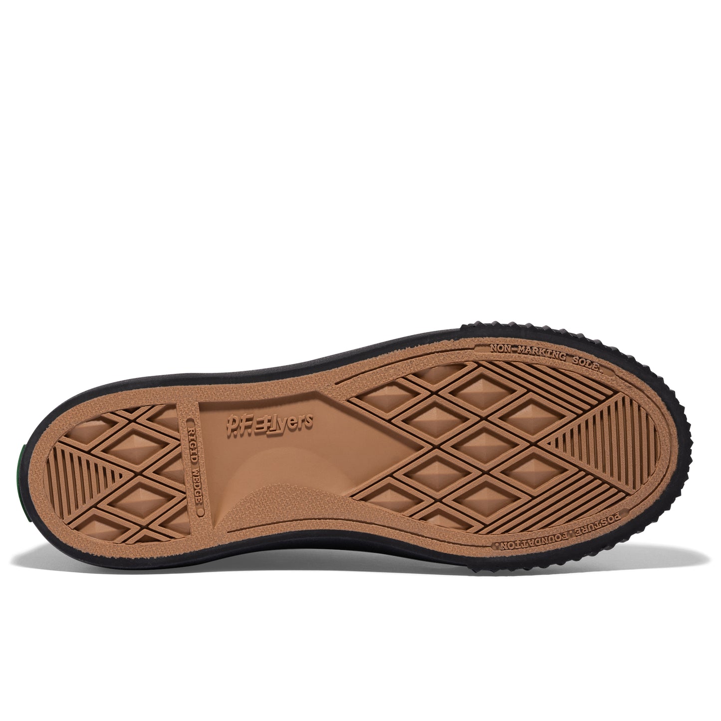 Brown sole of a black low-top sneaker on a white background.