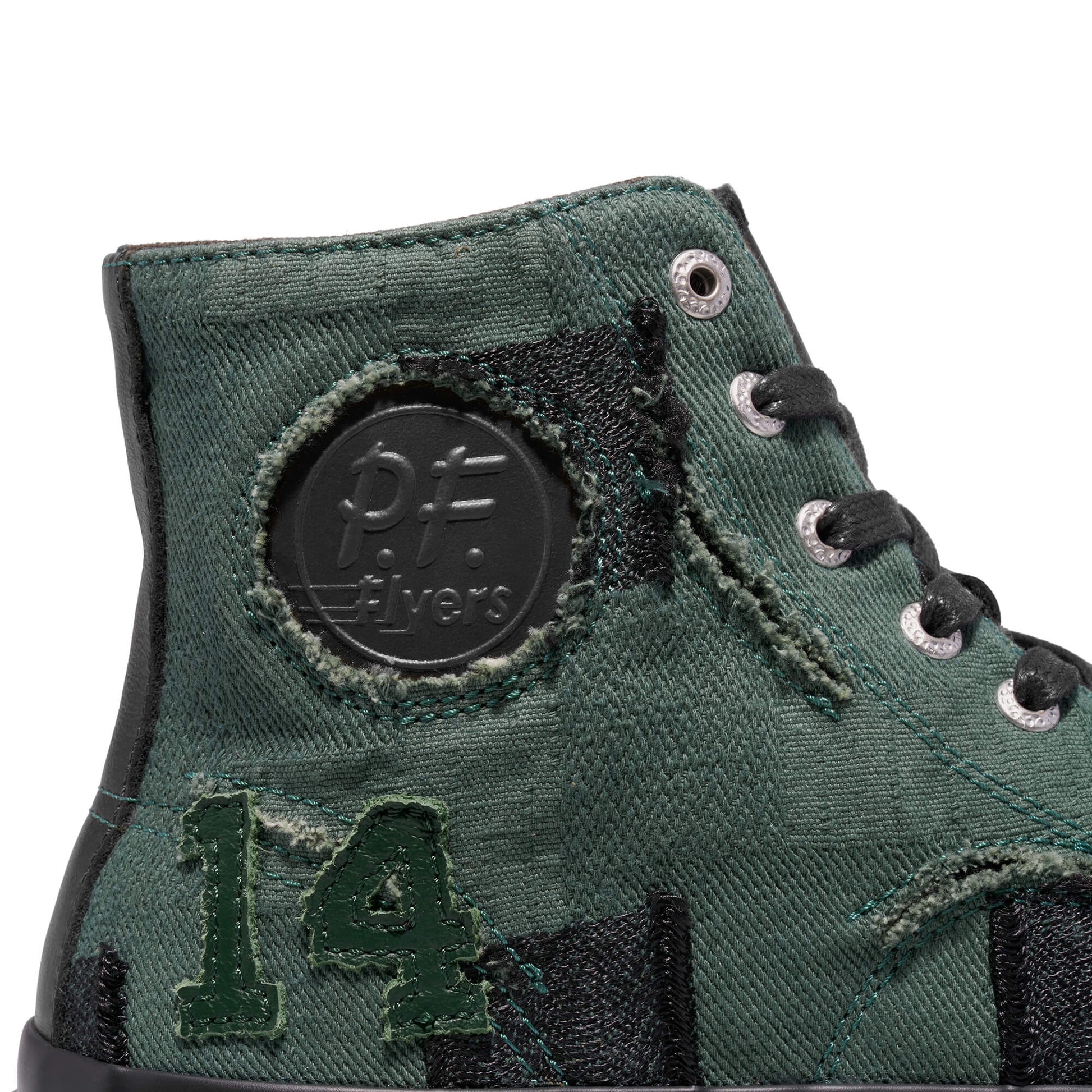 Green high-top sneaker with 'P.F. Flyers' logo and number '14' on a white background