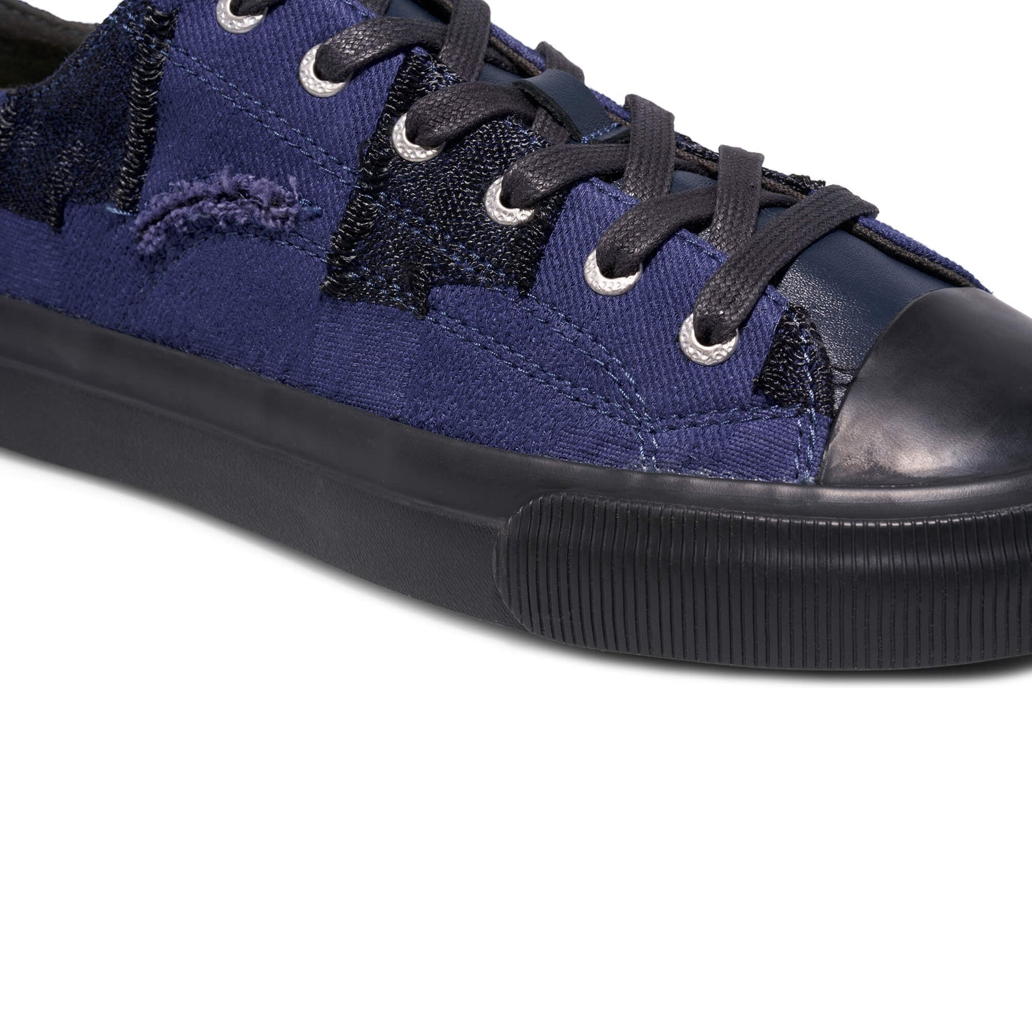 Blue sneaker with black accents on a white background