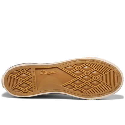 A brown shoe sole with a geometric pattern on a white background.