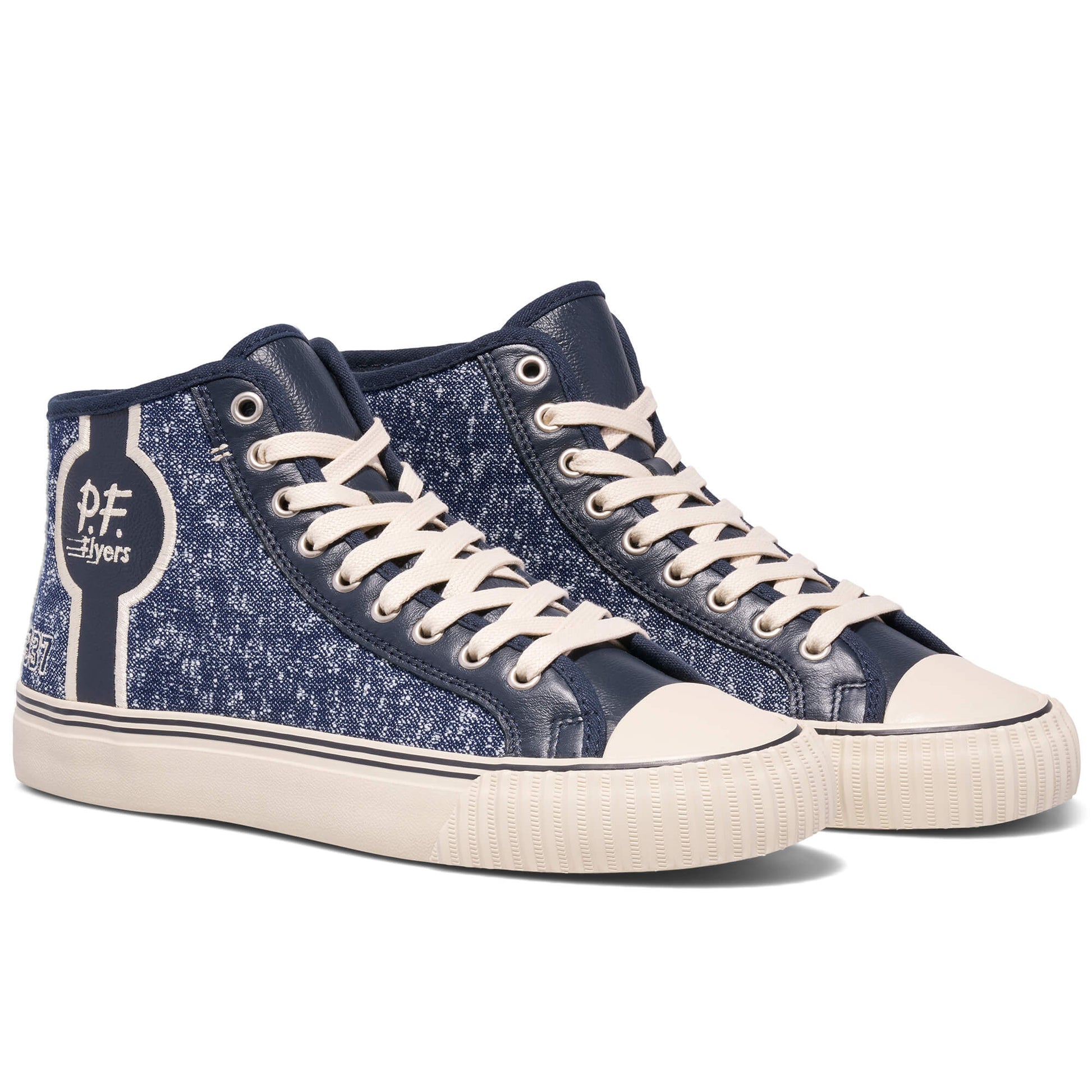 Pair of blue high-top sneakers with white laces on a white background