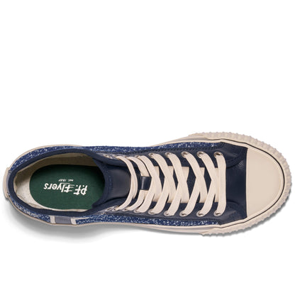 Navy blue sneaker with white laces on a white background