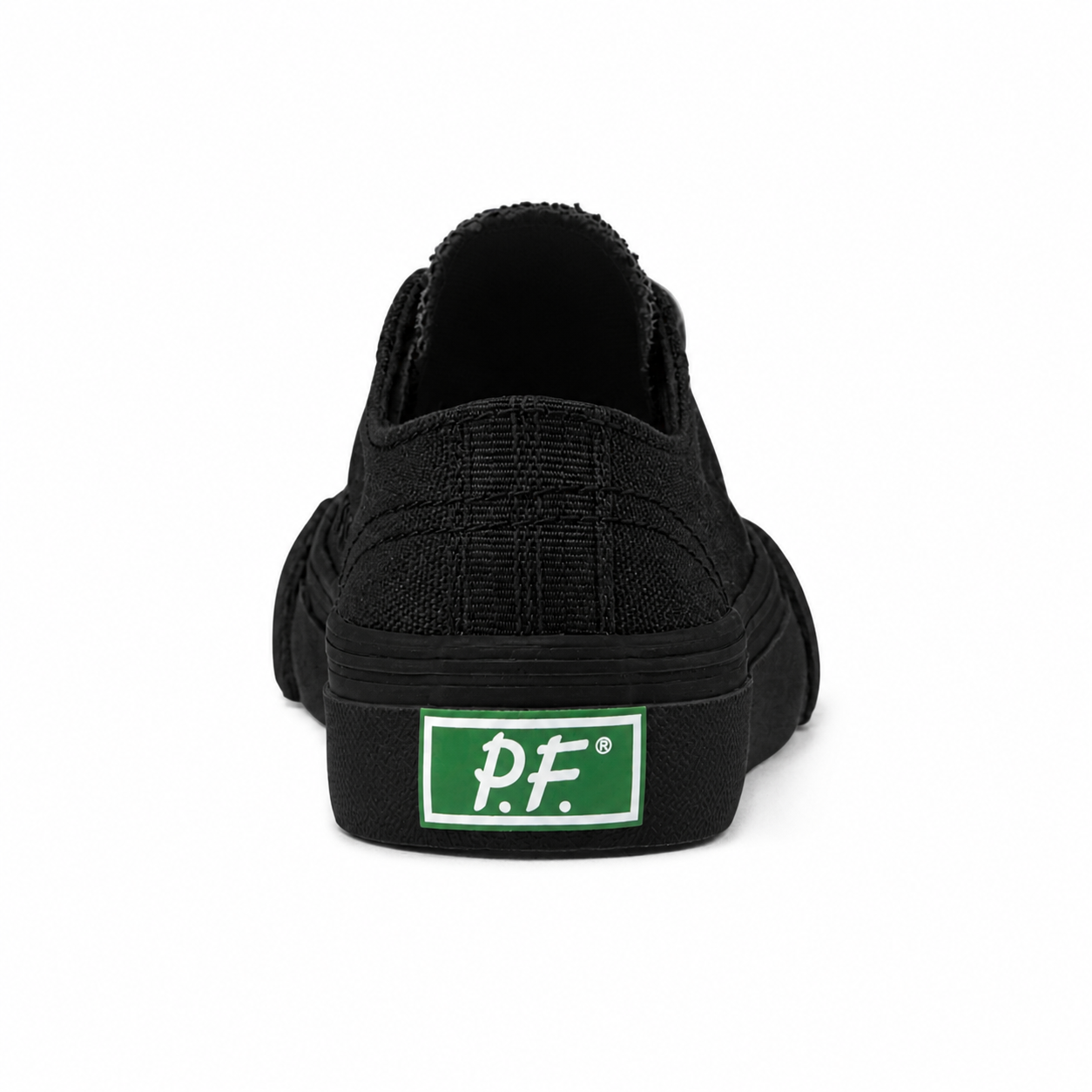 Black low-top sneaker on a white background.