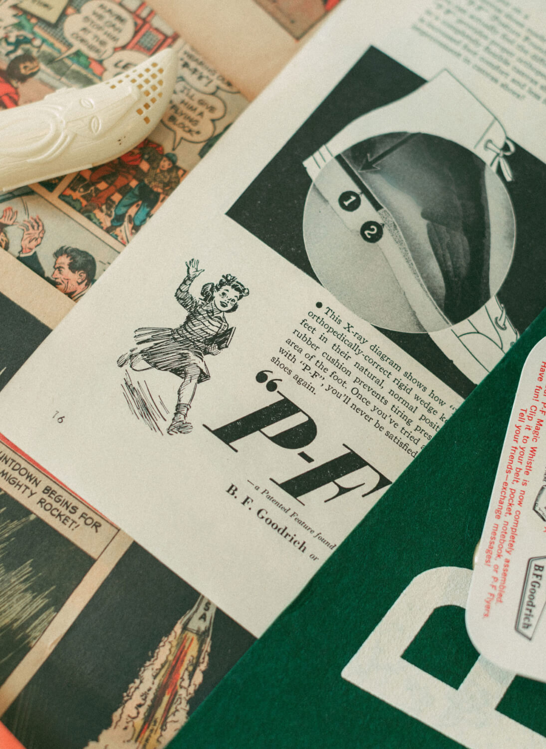 Close-up of a vintage magazine featuring a black-and-white illustration of a child and "P.F." text.